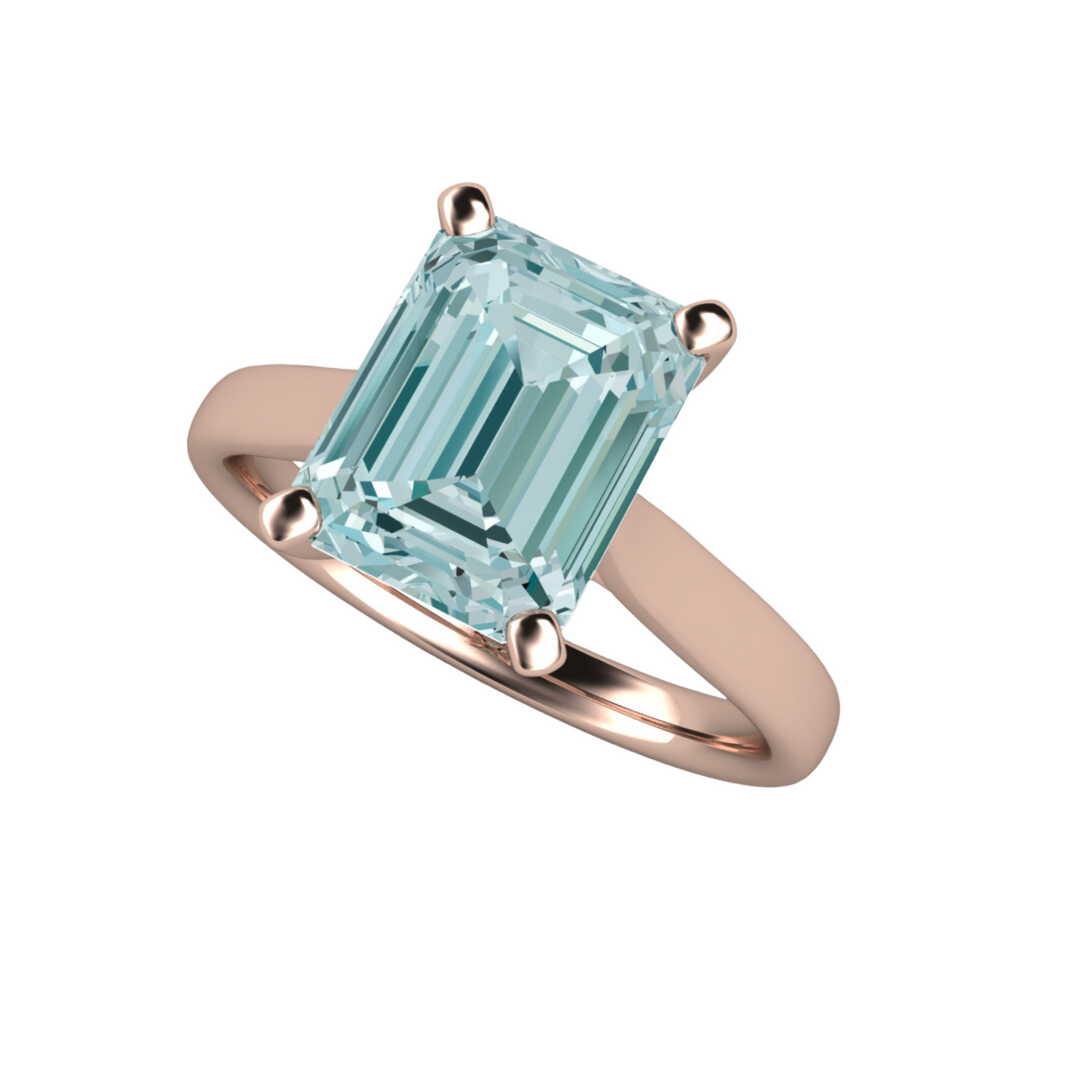 Natural Aquamarine Engagement Ring  in an 18K Rose Gold Four Prong Emerald Cut Solitaire Design from Rare Earth Jewelry