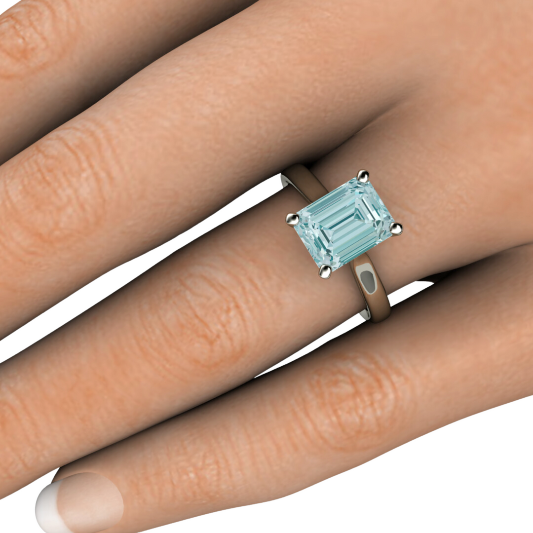 2ct Emerald Cut Aquamarine Engagement Ring | Classic 4 Prong Solitaire Setting in Gold or Platinum 9x7mm Shown on the Hand