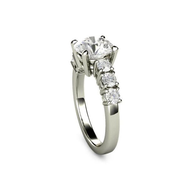 2ct round Moissanite soliatire engagement ring, 4 prong accented setting.