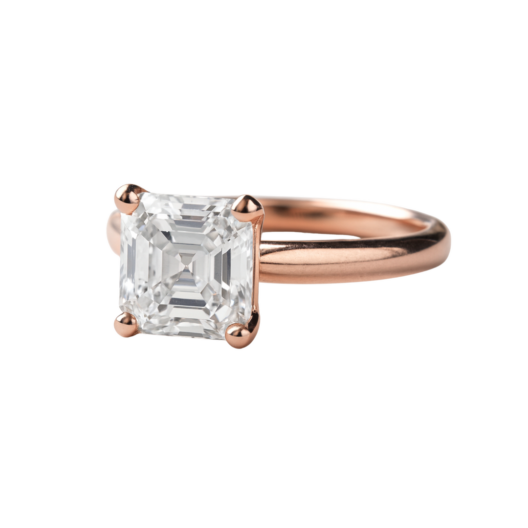 An 8mm asscher diamond engagement ring, 3 carat solitaire design available in 14K or 18K Gold and Platinum, shown in Rose Gold | Eco-Friendly Engagement Rings from Rare Earth Jewelry
