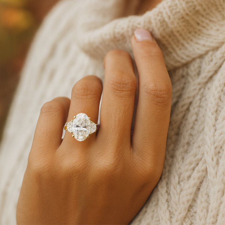 3 Carat Oval Engagement Ring on the Hand, 3 Stone Style with Half Moon Sides, 5ct Lab Grown Diamond Statement Ring | Rare Earth Jewelry