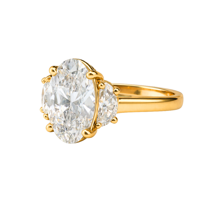 Side view of 3 carat lab grown diamond engagement ring with elongated oval and half moon side stones in a three stone design | Rare Earth Jewelry
