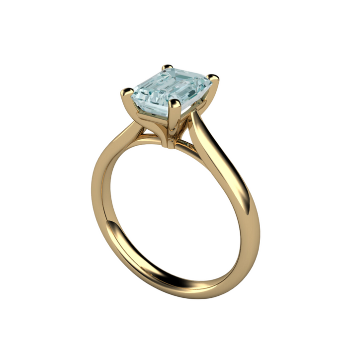 Aquamarine engagement ring emerald cut solitiare in 14K Yellow Gold from Rare Earth Jewelry.