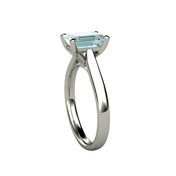 Aquamarine engagement ring emerald cut solitiare side view in white gold