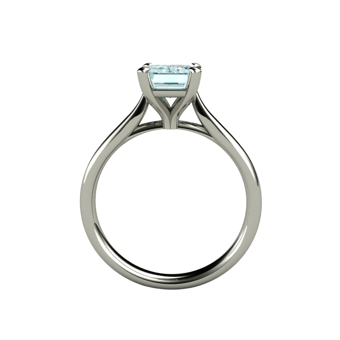 Aquamarine engagement ring emerald cut solitiare viewed thru the finger