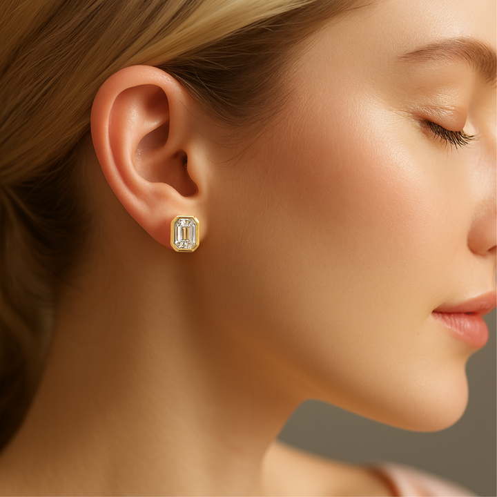 Emerald Cut Lab Grown Diamond Stud Earrings 2ct Each 4ctw Pair Bezel Set in Yellow Gold Shown on Model | Rare Earth Jewelry