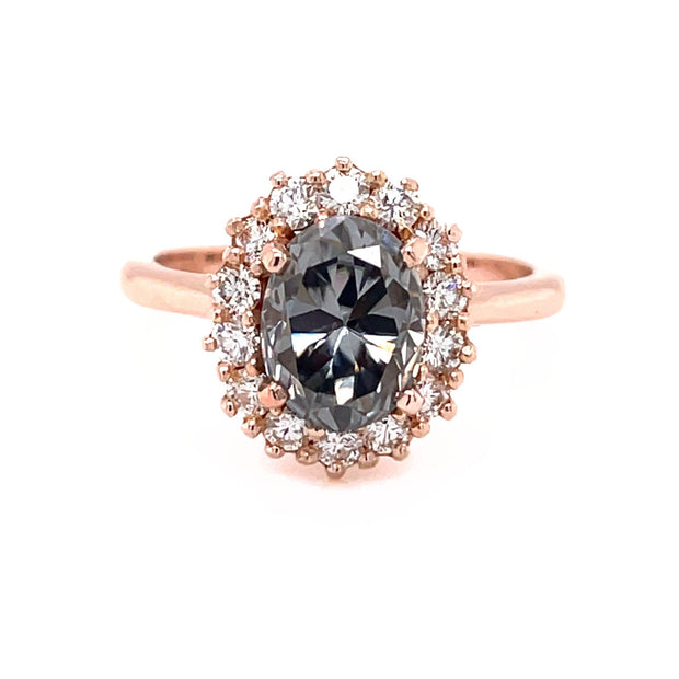 Gray Moissanite oval engagement ring.  Grey Moissanite halo ring with a vintage inspired cluster style design in rose gold.