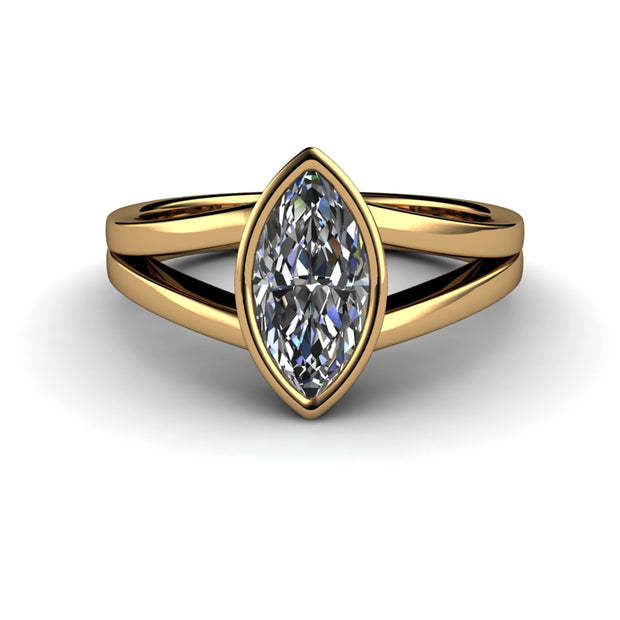 A 1ct marquise cut Forever One Moissanite solitaire ring in 18K Yellow Gold bezel setting with double split shank.
