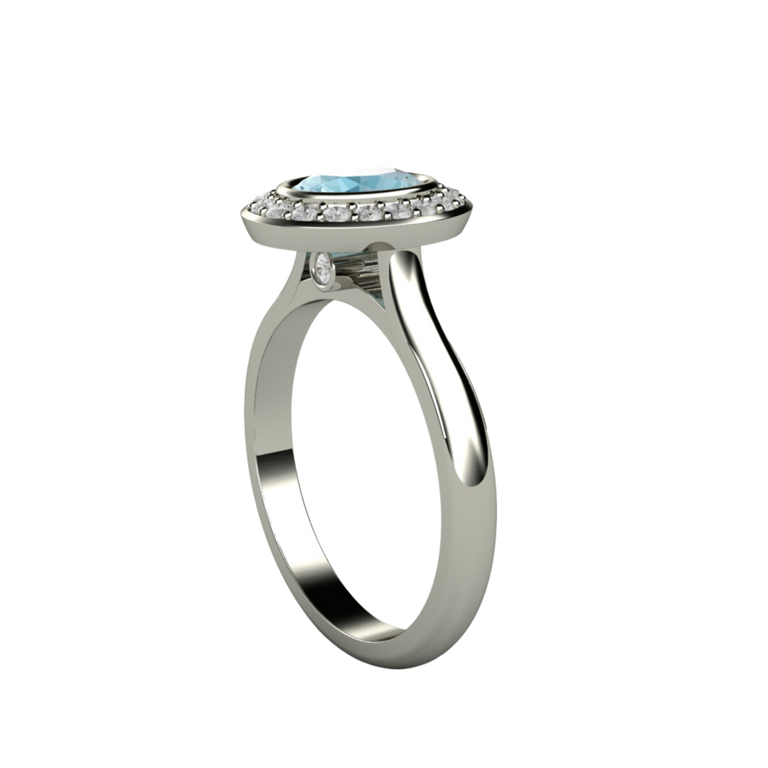 Oval Bezel Set Aquamarine Ring with Hidden Diamond in the Gallery, Side View shown in White Gold