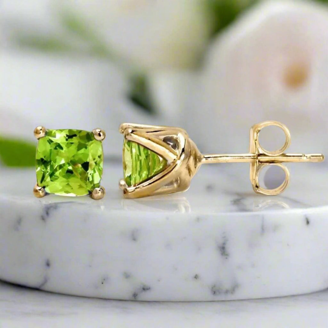 Cushion Cut Peridot Stud Earrings in 14K Gold, August Birthstone Earrings in Woven Prong Settings.