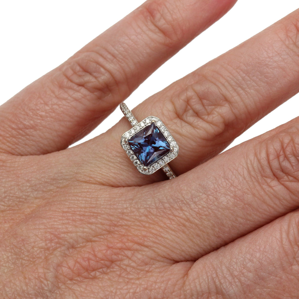 Princess Cut Alexandrite Engagement Ring | Unique Color Change Stone with Diamond Halo Shown on the Hand