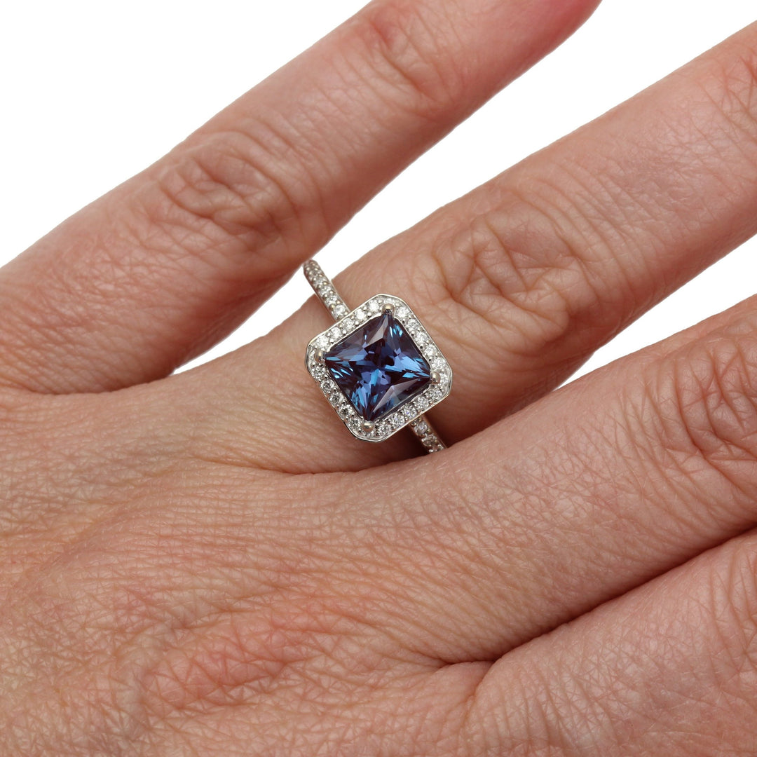 Princess Cut Alexandrite Engagement Ring | Unique Color Change Stone with Diamond Halo Shown on the Hand