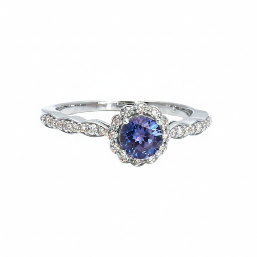 A vintage style Alexandrite Engagement Ring with Diamond Halo and Scalloped Band.  Shown in Platinum