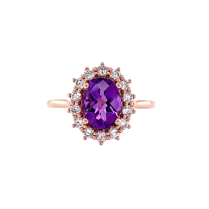 A vintage inspired Amethyst and Diamond ring.  Amethyst Oval Ring with Diamond Accents in Rose Gold. 
February Birthstone Ring from Rare Earth Jewelry.