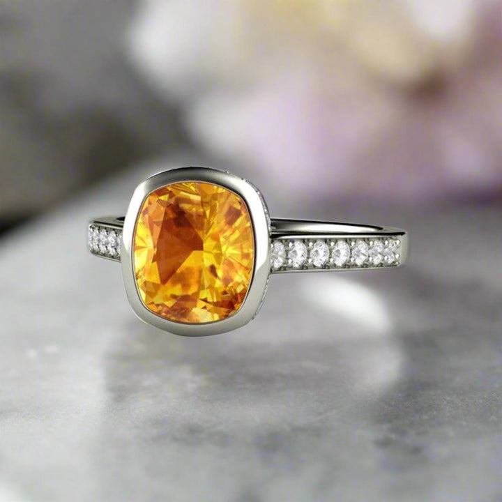 Yellow Sapphire Engagement Ring with a Cushion Cut Bezel Setting and Hidden Diamond Halo, Minimalist Solitaire Design from Rare Earth Jewelry