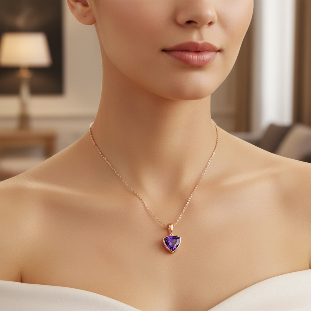 Model wearing natural amethyst triangle pendant necklace in 14K rose gold, minimalist bezel set February birthstone | Rare Earth Jewelry