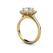 Antique style oval cathedral halo engagement ring setting in yellow gold.