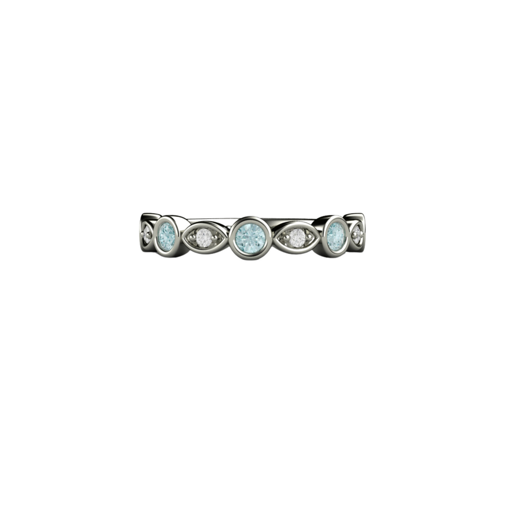 An Aquamarine and diamond band, unique wedding ring or stacking ring in white gold