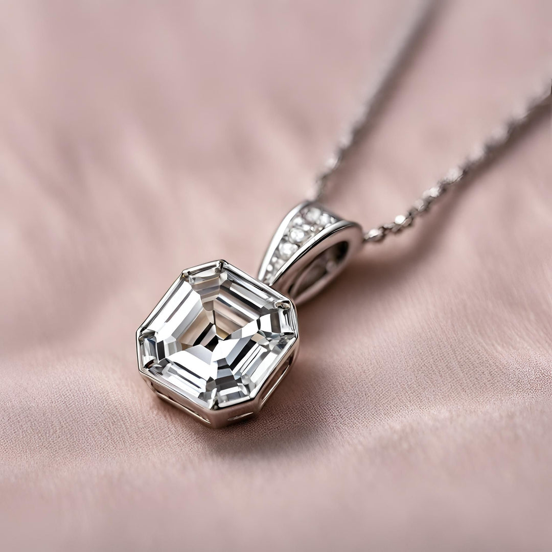 A lab grown diamond pendant, large asscher cut diamond pendant necklace in a sleek modern design in 14K Gold from Rare Earth Jewelry.