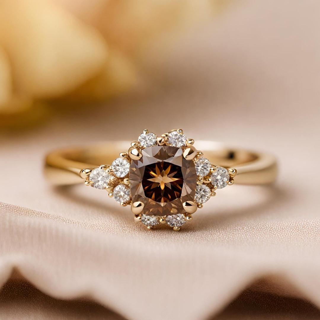 A cognac brown diamond engagement ring in a dainty vintage style design from Rare Earth Jewelry.