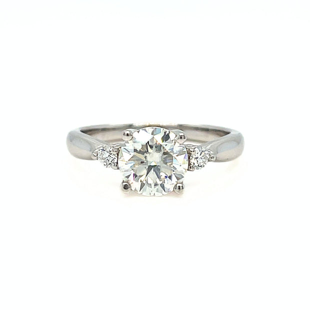 Charles and Colvard colorless Moissanite 3 stone ring, lab created diamond alternative engagement ring in white gold.