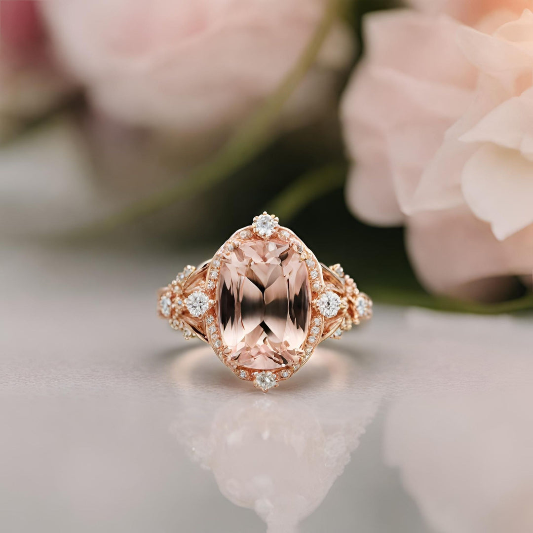 A cushion cut Morganite ring with a baroque style antique design with diamonds in Rose Gold from Rare Earth Jewelry.