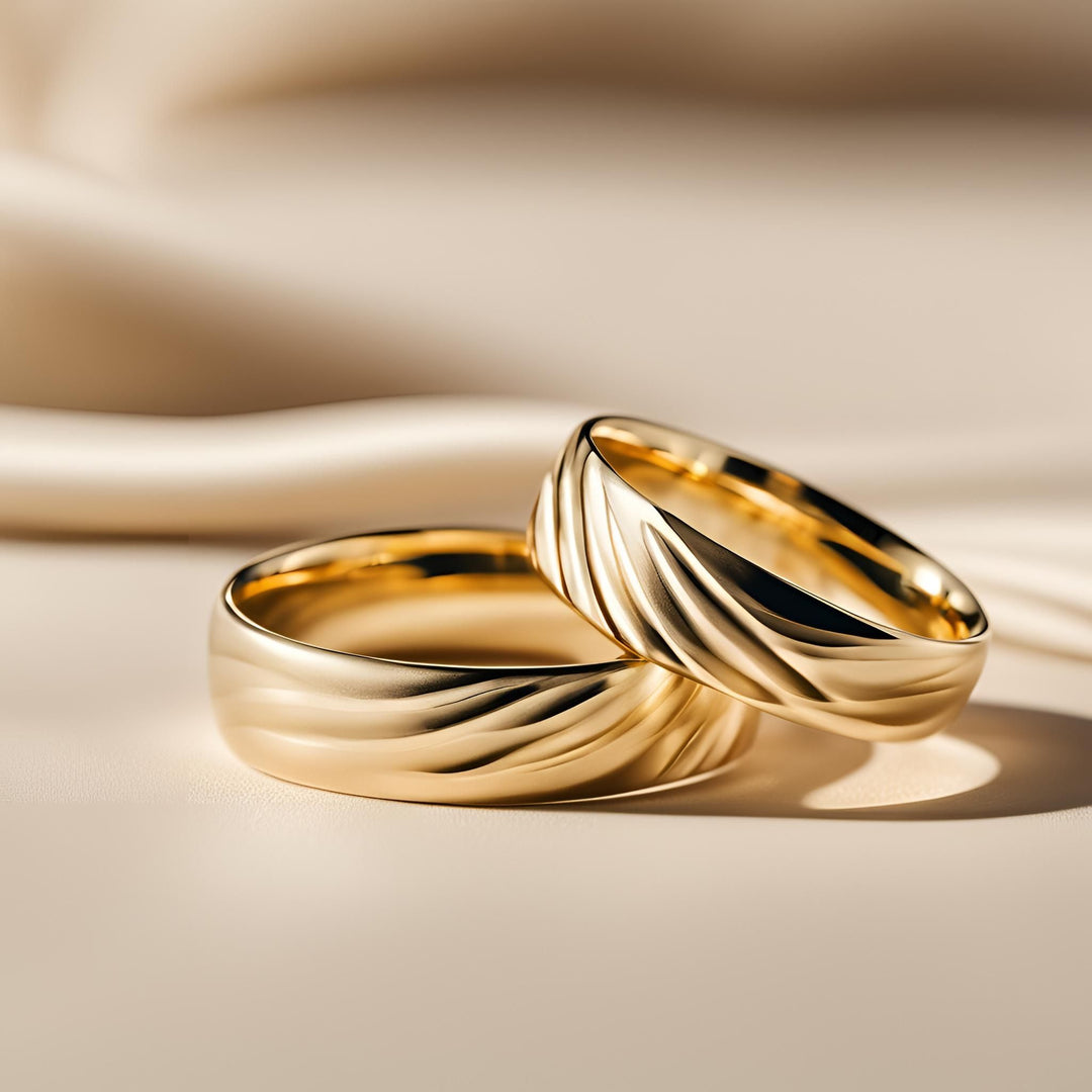 Custom wedding bands in yellow gold with a modern woven ribbon design from Rare Earth Jewelry.