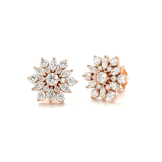 Diamond snowflake earrings in a flower cluster style design, available in lab grown or natural diamonds.