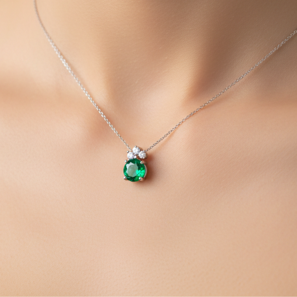 Emerald and diamond necklace shown on model with round emerald pendant in solid 14K Gold | Rare Earth Jewelry