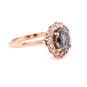 Gray Moissanite ring in an oval diamond halo style in Rose Gold.  Oval Moissanite halo ring.  Unique engagement ring with gray gemstone.