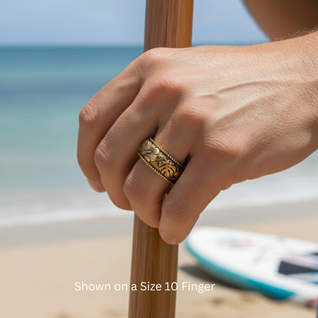 14K white gold hibiscus and monstera tropical ring shown on man's hand, Hawaiian beach wedding band, unisex his and hers floral design | Rare Earth Jewelry