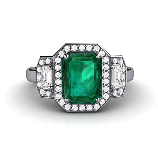 Large three stone ring with lab grown emerald and diamonds in Platinum