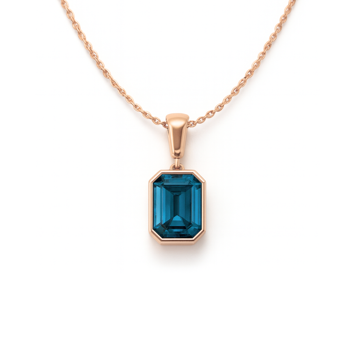 emerald cut london blue topaz pendant necklace in 14k rose gold minimalist bezel design | Rare Earth Jewelry