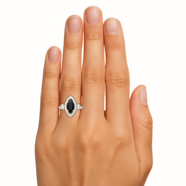 Marquise Cut Natural Black Diamond Engagement Ring shown on the Finger, Vintage Inspired 3 Stone Halo Design with Milgrain and Filigree in Gold or Platinum | Rare Earth Jewelry