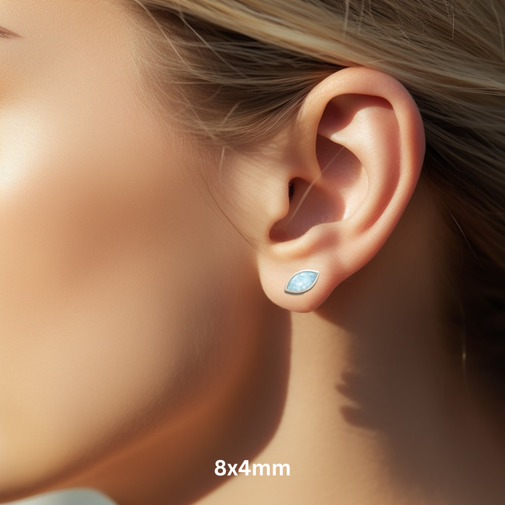 8x4mm Marquise Cut Aquamarine Stud Earrings on the Ear, Natural Aquamarne Earrings in 14K Gold, available in singles or in pairs, March Birthstone Jewelry | Rare Earth Jewelry