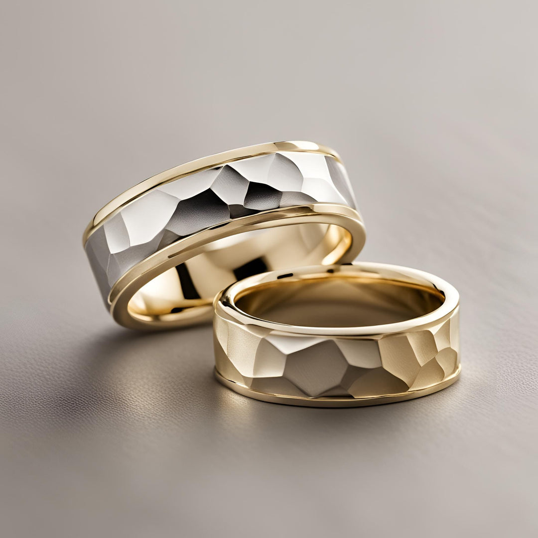 A pair of modern wedding bands with an abstract geometric carved design from Rare Earth Jewelry.