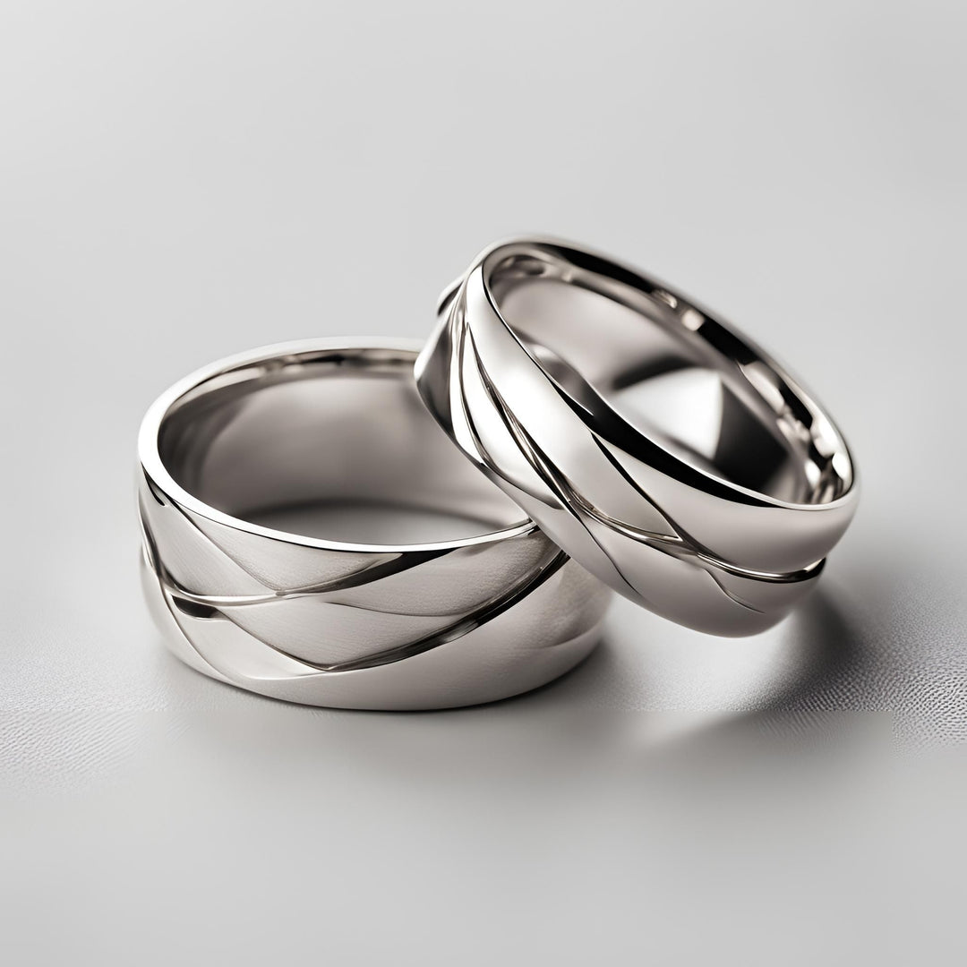 A pair of his and hers custom wedding bands in a modern woven pattern in gold or platinum from Rare Earth Jewelry.