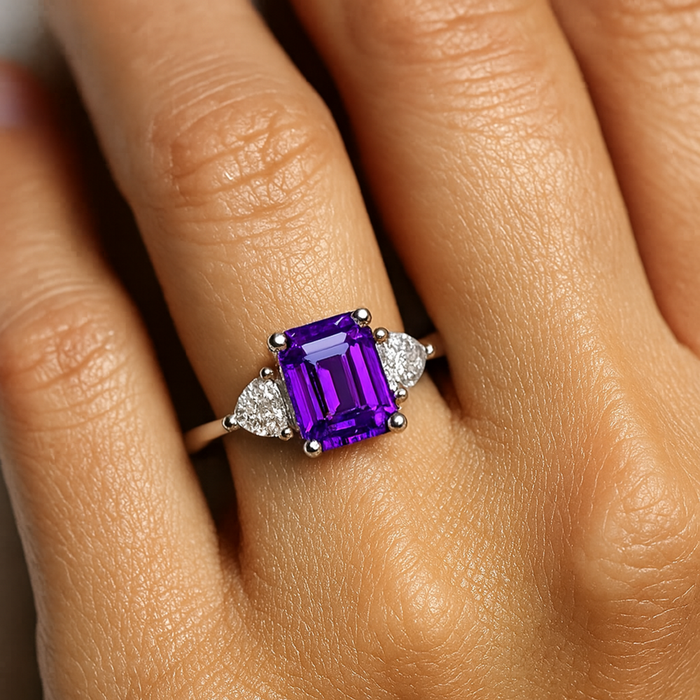 Emerald Cut Amethyst Ring on Hand, Three Stone Amethyst Ring with White Sapphire Trillions Hand Photo, February Birthstone Jewelry from Rare Earth Jewelry