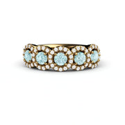 Natural Aquamarine wedding ring with diamond halos in 18K Yellow Gold.  Unique anniversary band or March birthstone band.