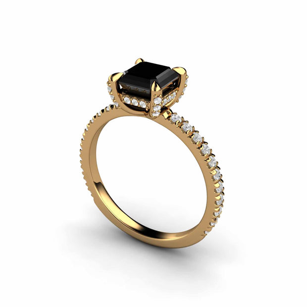 Natural Black Diamond engagement ring with diamond studded prongs and french pave setting in 18K Yellow Gold.