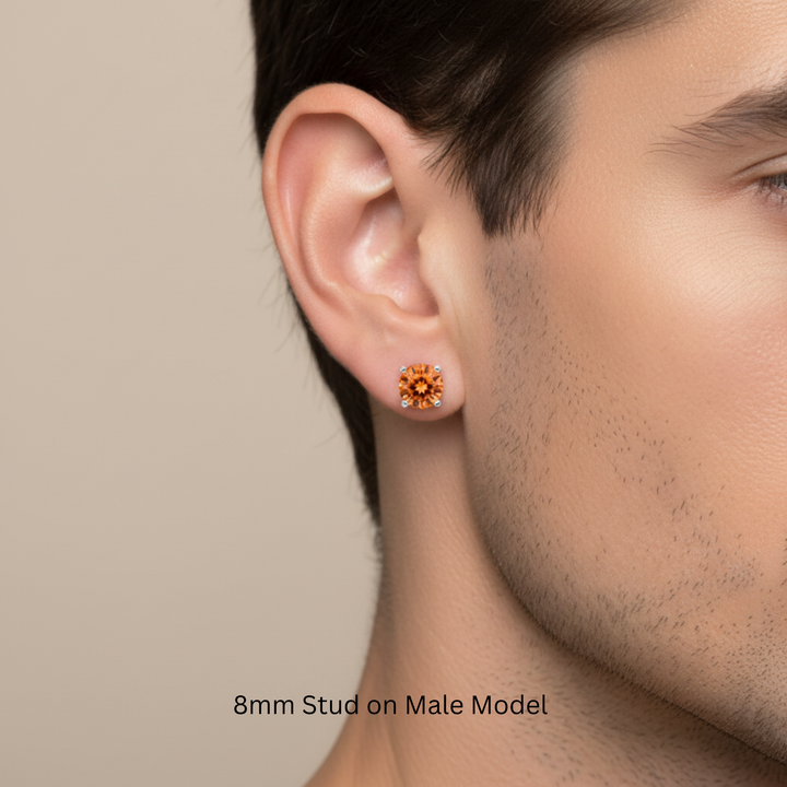 8mm natural orange topaz stud earring on male model, bold sunrise orange gemstone in 14k gold, unisex style for men and women, single or pair available | Rare Earth Jewelry