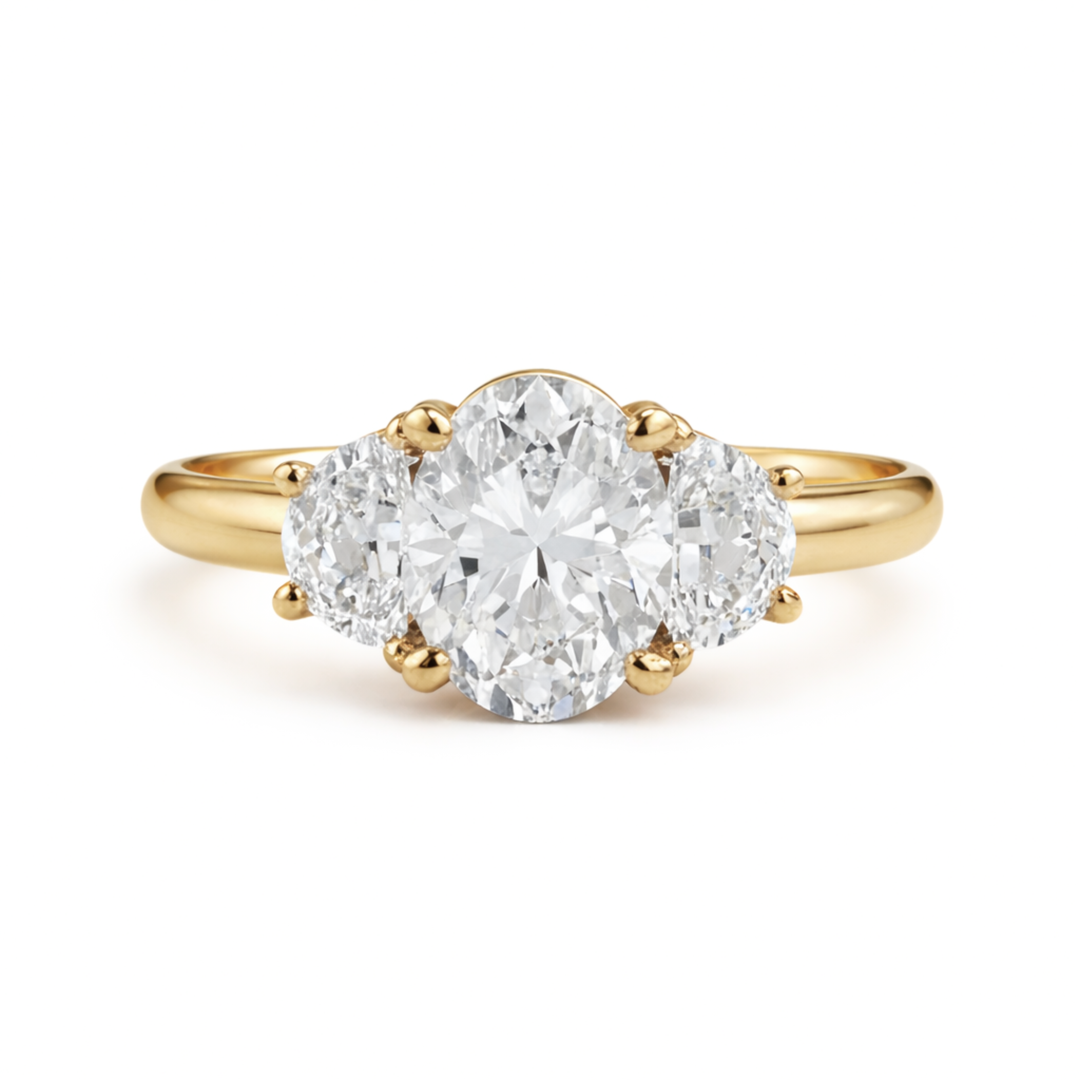 Oval Cut Moissanite Engagement Ring, 3 Stone Style with Half Moon Side Stones shown in Yellow Gold | Lab Created Engagement Ring | Rare Earth Jewelry