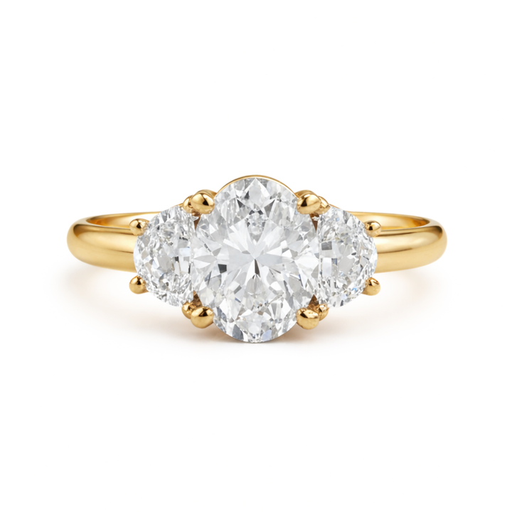 Three Stone Moissanite Engagement Ring in 18K Yellow Gold with an 8x6mm Oval Colorless Moissanite and two Half Moon Accent Stones | Rare Earth Jewelry