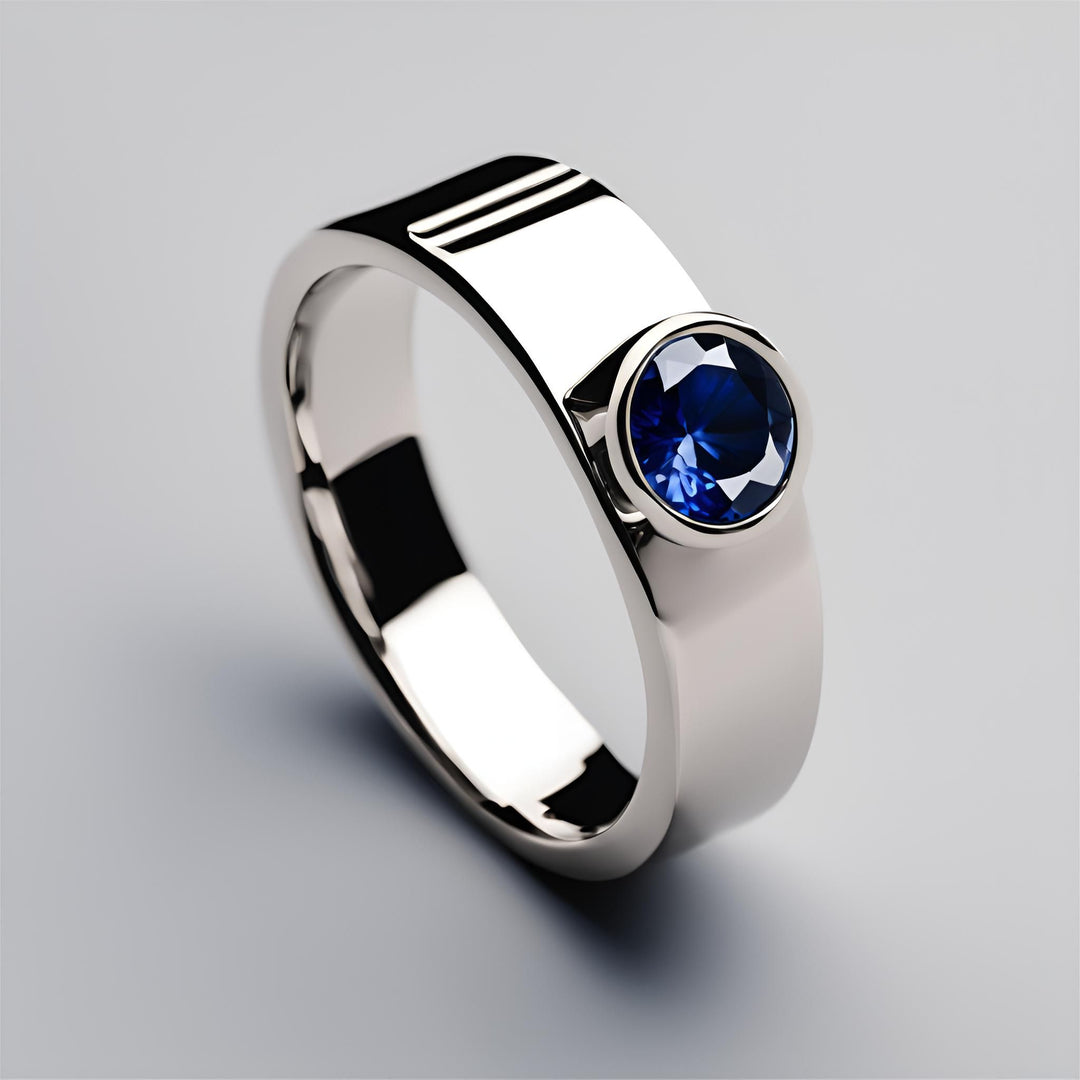 Round blue sapphire bezel set ring for men or women, simple classic style from Rare Earth Jewelry.