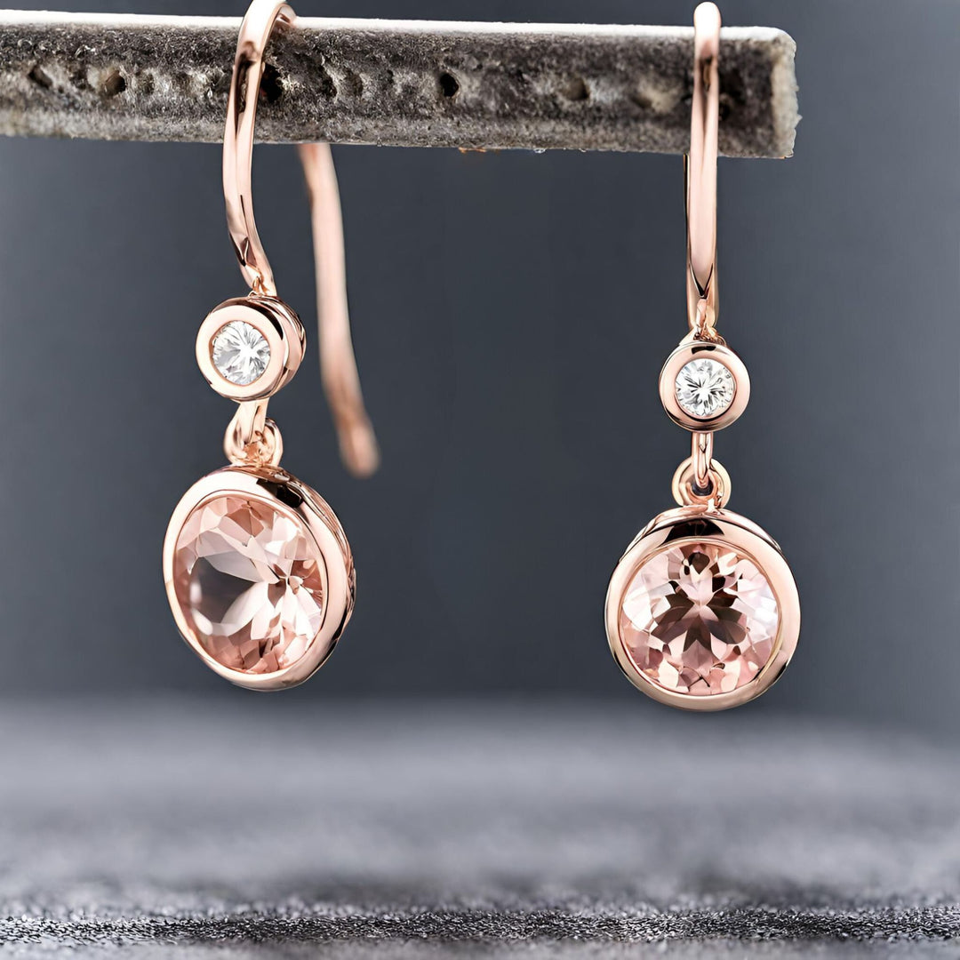 Round morganite earrings bezel set dangles with diamonds in rose gold from Rare Earth Jewelry.