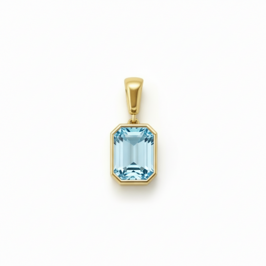 emerald cut sky blue topaz pendant in 14k yellow gold bezel set natural topaz, December birthday gift or push present | Rare Earth Jewelry