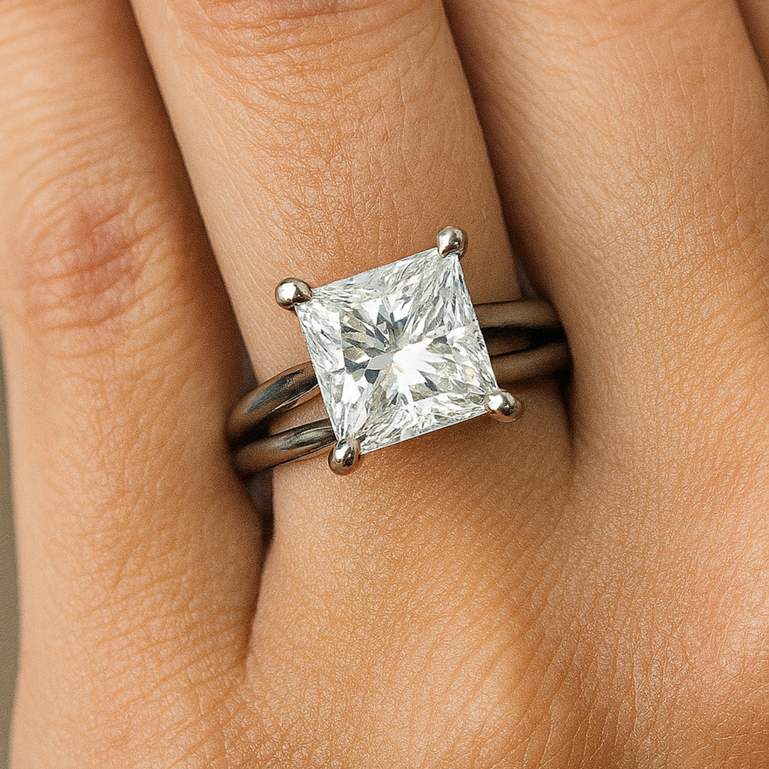 Square Moissanite Engagement Ring close up on finger, 3 Carat Princess Cut Forever One Moissanite Solitaire with Split Shank Design | Rare Earth Jewelry