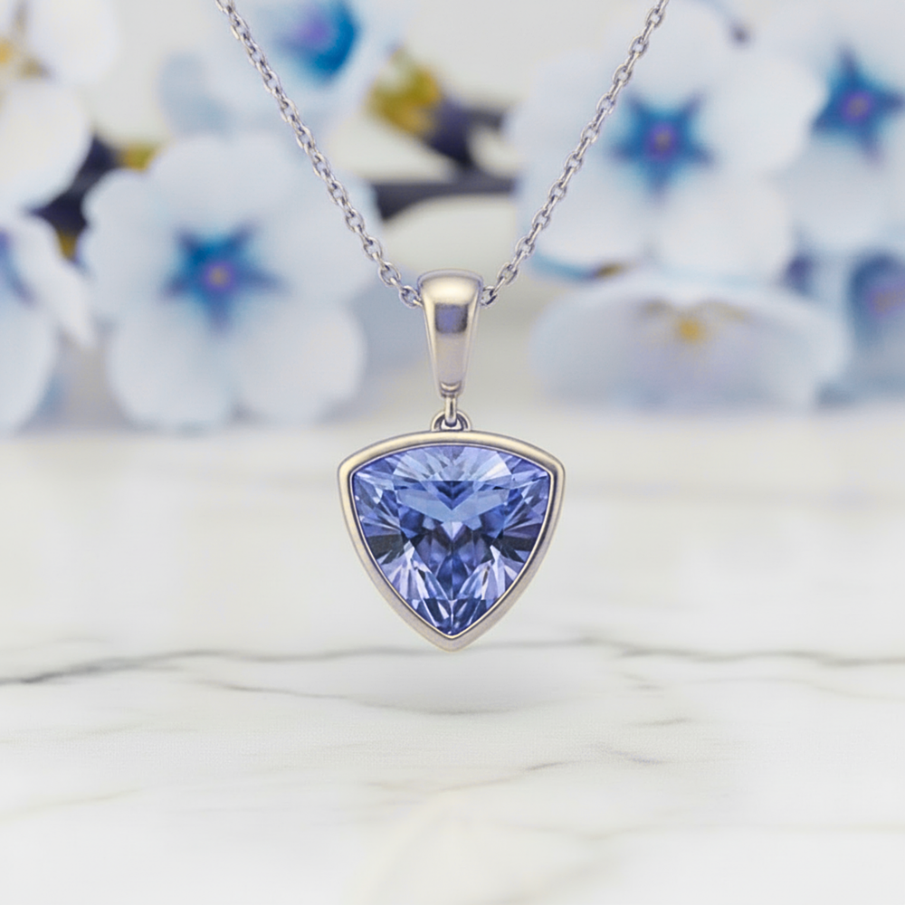 Light blue sapphire trillion pendant in 14K white gold, Ceylon blue sapphire necklace close up | Rare Earth Jewelry