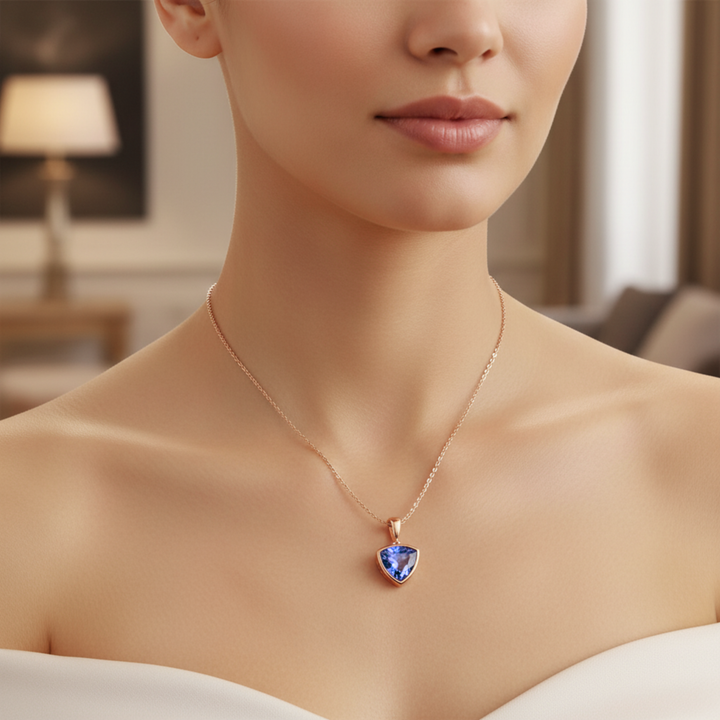 Trillion cut blue sapphire necklace on model, 14K rose gold Ceylon blue sapphire pendant | Rare Earth Jewelry