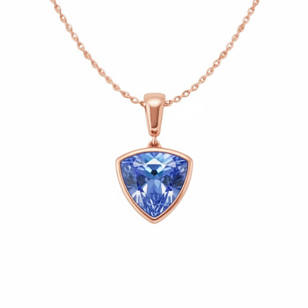 Trillion cut light blue sapphire necklace in 14K rose gold, Ceylon blue sapphire bezel pendant | Rare Earth Jewelry